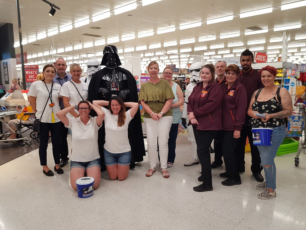 Mitchells Miracles staff_raising funds at Sainsburys with sponsors UK Garrison_Mitchells Miracles_Neuroblastoma childrens cancer charity for the UK